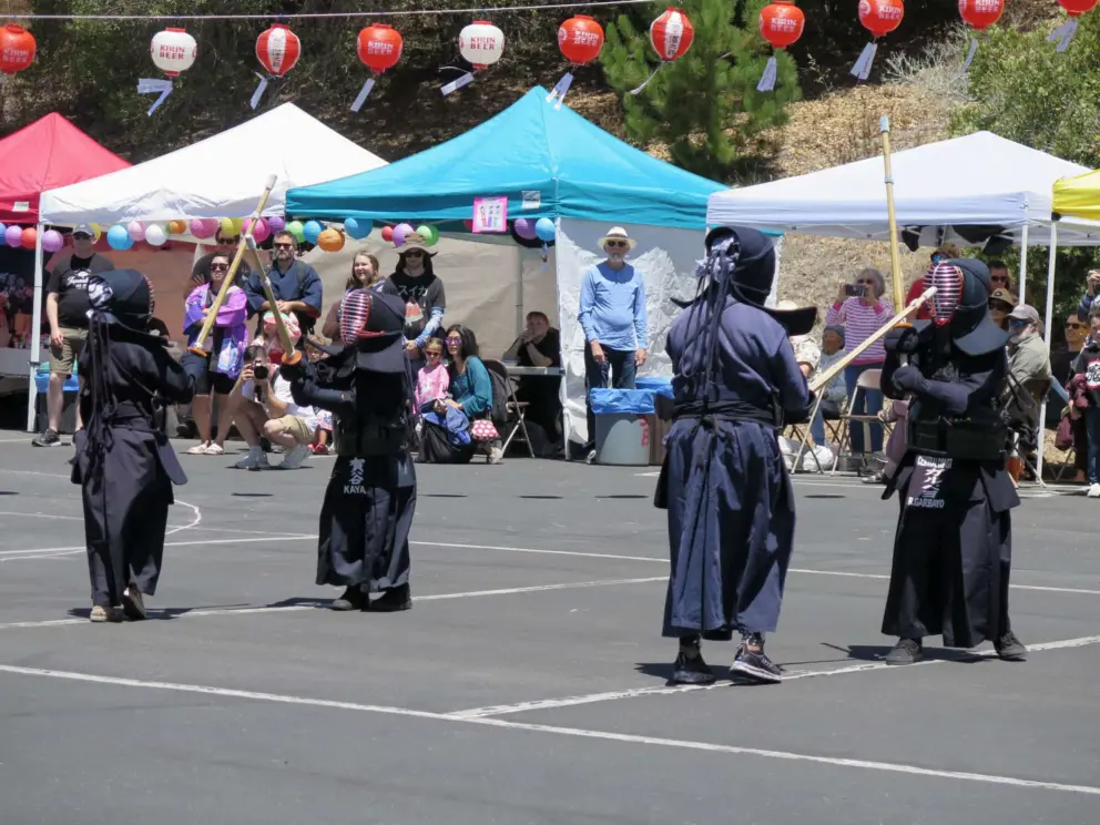 Sword fighting demonstration (Kendo) at the Obon Festival at SLO Buddhist Temple in August. You can walk there from the Bob Jones Trail. 