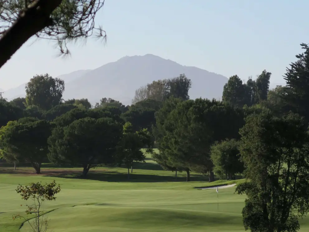 Madonna Mountain behind the golf course. 