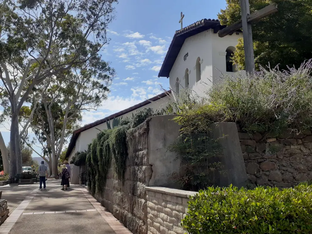 Stone wall in front of the mission.