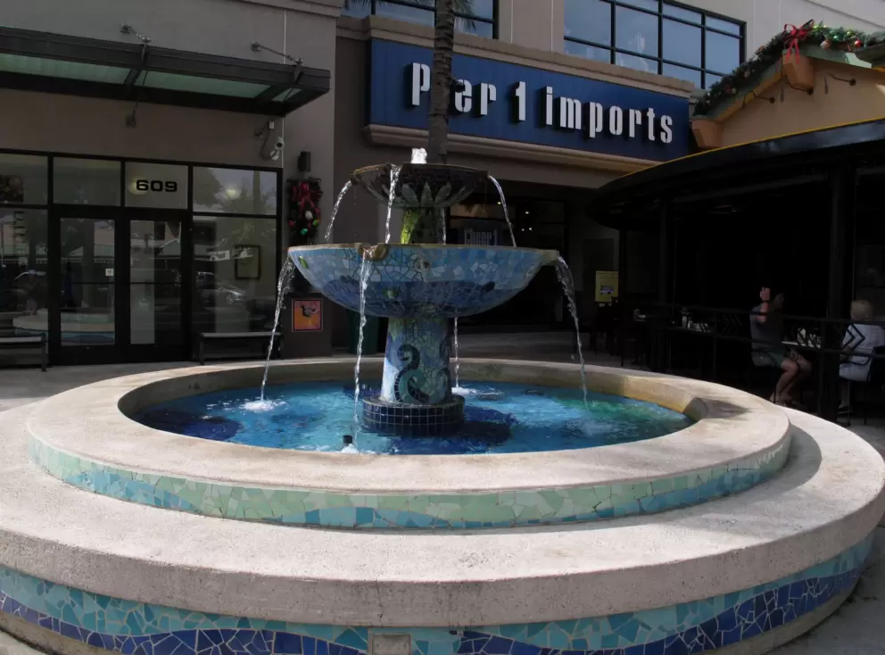 Deep blue fountain outside Pier One Imports.
