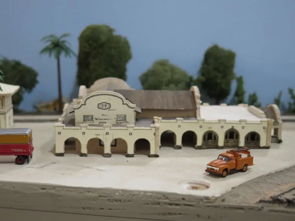 Mission style train station in the model railroad. 