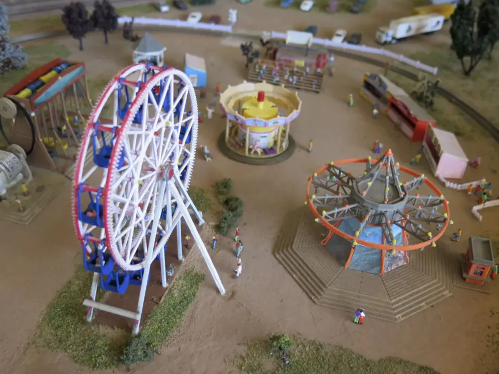 Carnival rides in the model railroad. 