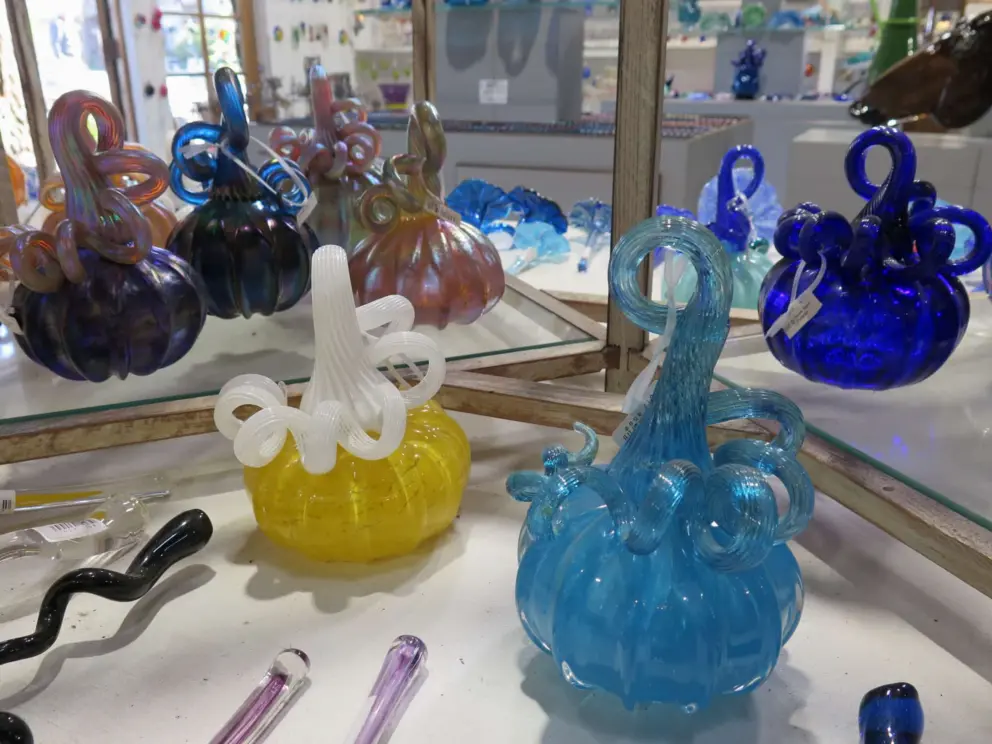 Glass pumpkins of many colors in October.