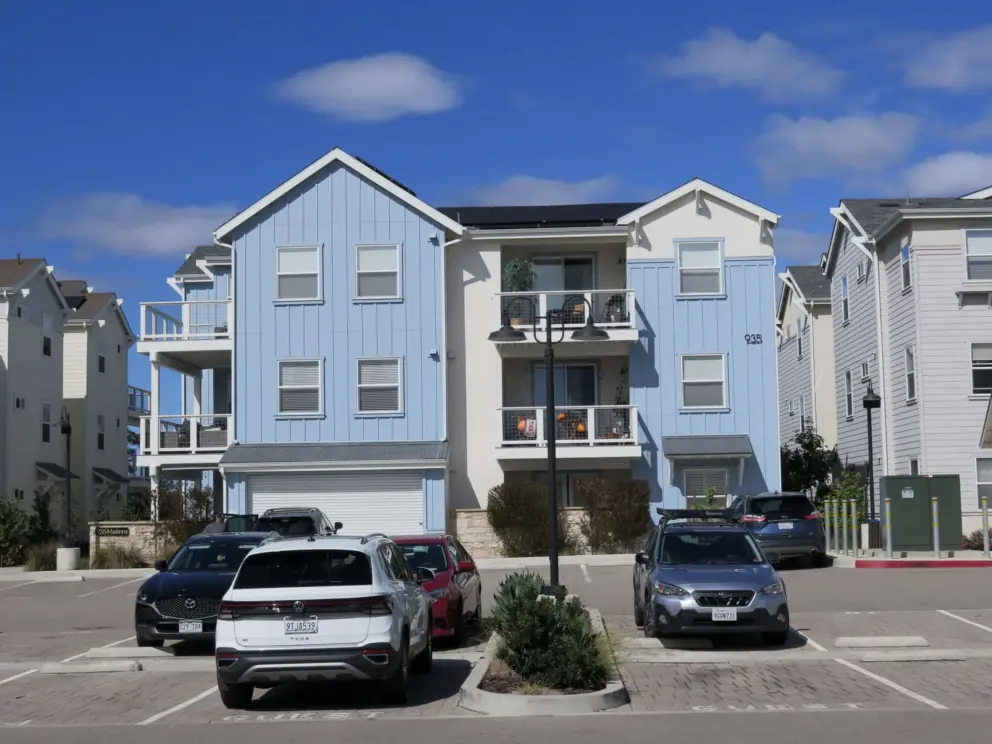 Blue building and blue sky with little clouds!