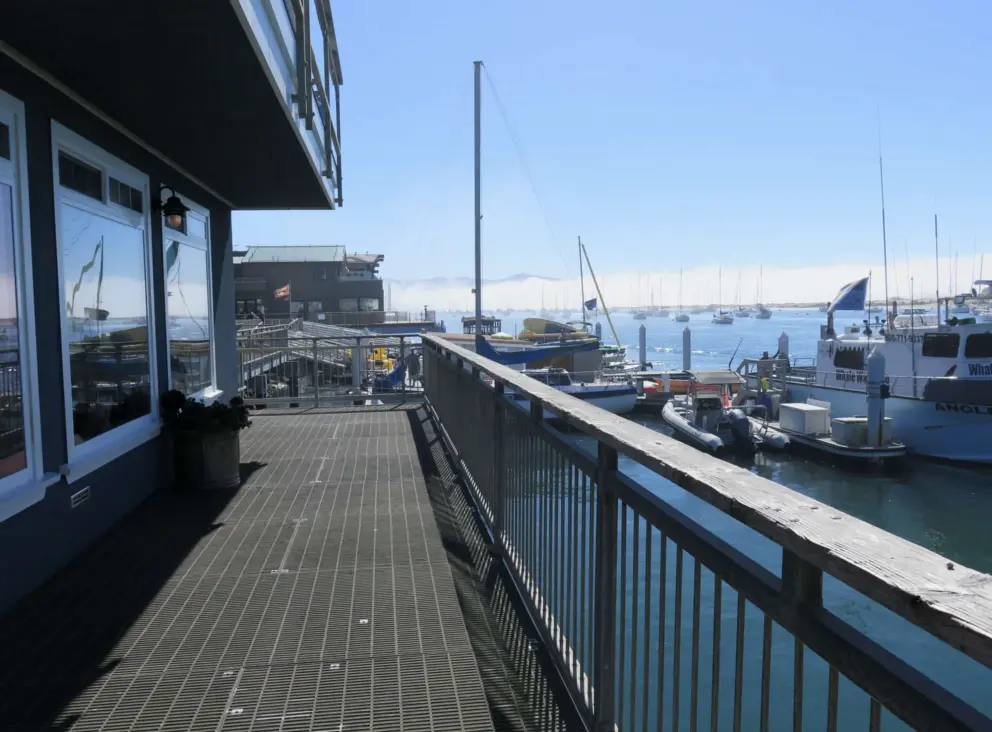 The walkway continues in front of a restaurant. 