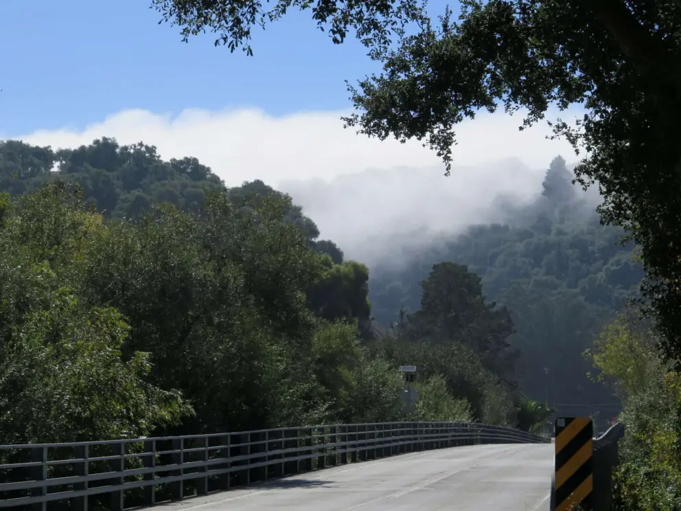 Fog rolling in at the bridge where the hike begins. 