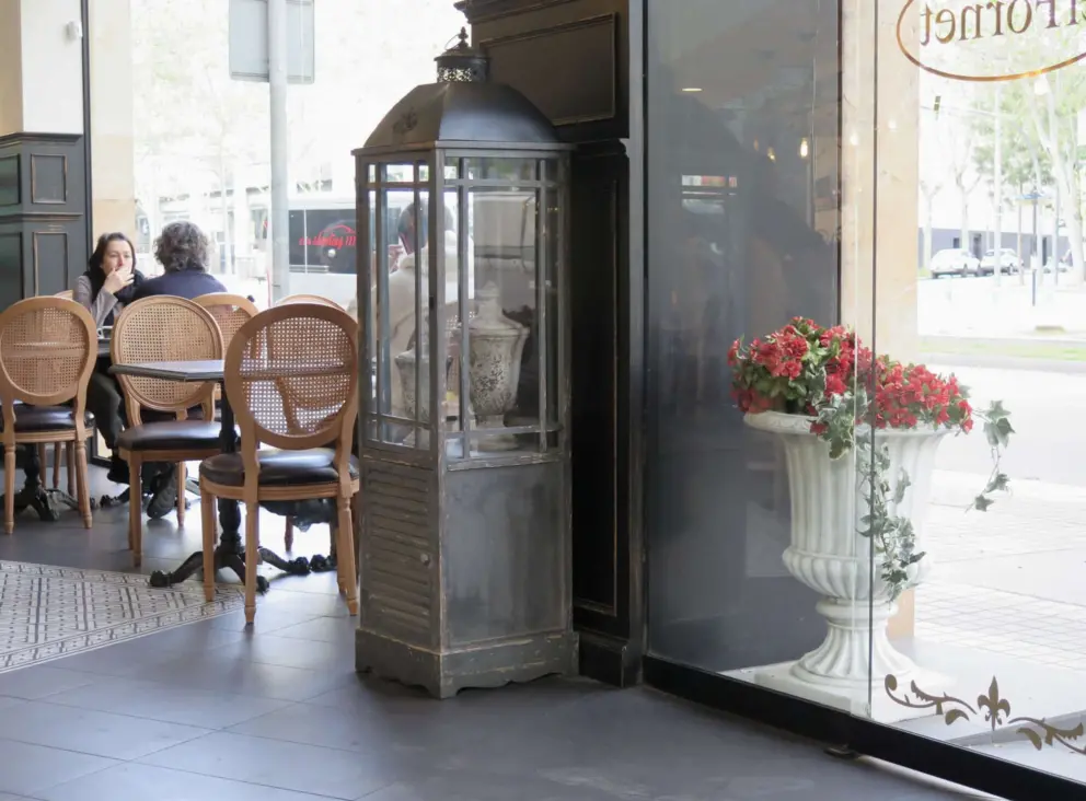 Sitting inside El Fornet Bakery by the huge windows. 