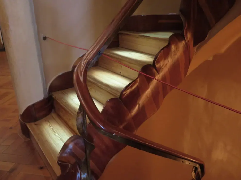 Pretty shapes in the wood of a staircase tucked away. 