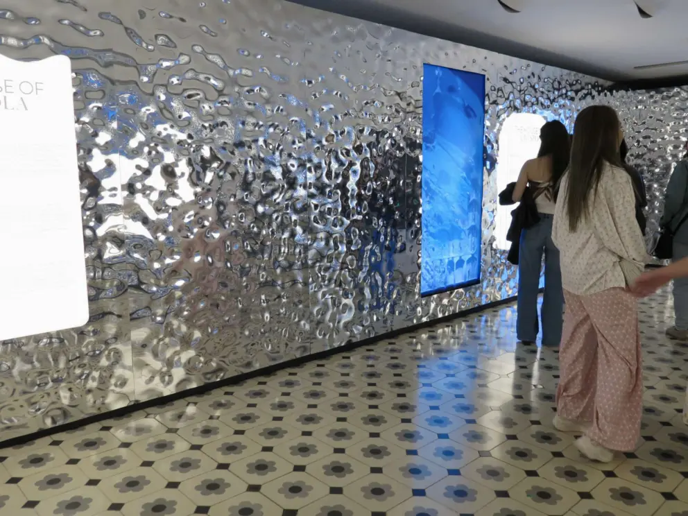 Metallic wall near the gift shop. 