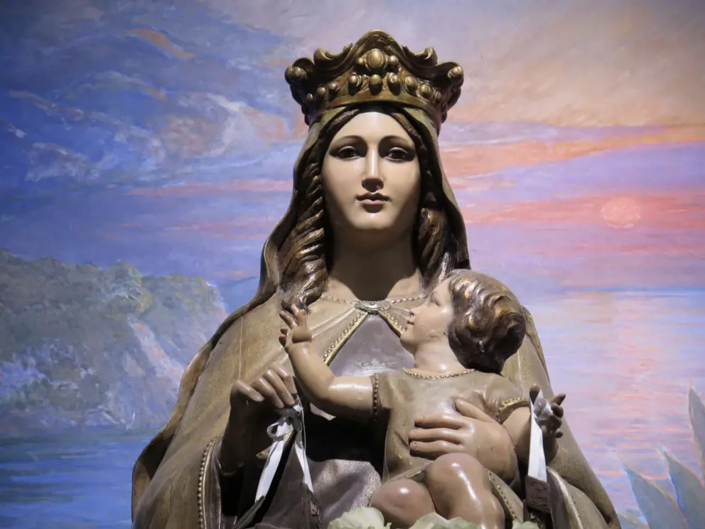 A beautiful sculpture of Mary and Jesus, in Sant Roma Church of Lloret de Mar. 