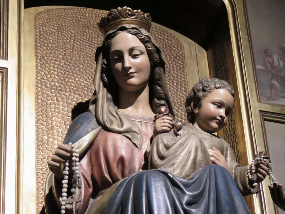 Baby Jesus and Mary, with a sweet face. 