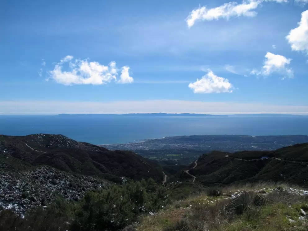 Cottonball clouds, islands and valleys.