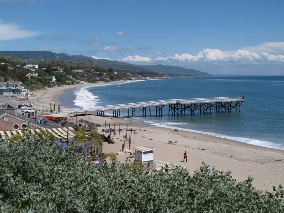 View of the beach and pier from the top of the stairs. Wow!