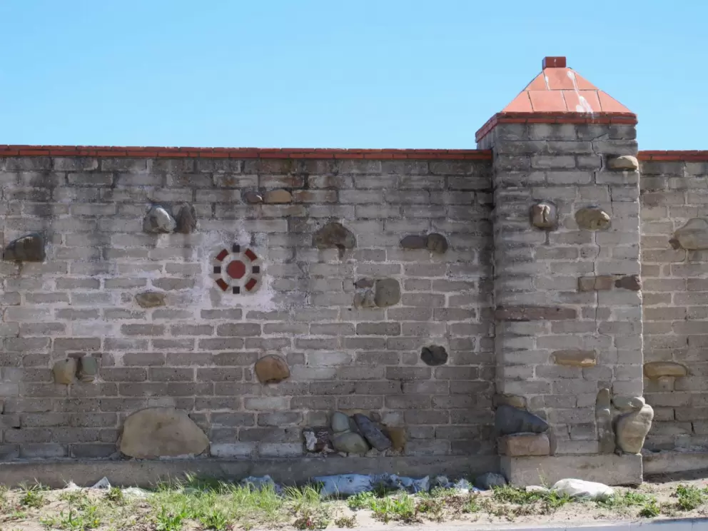 Wall at the parking lot. It was built as part of Adamson House.