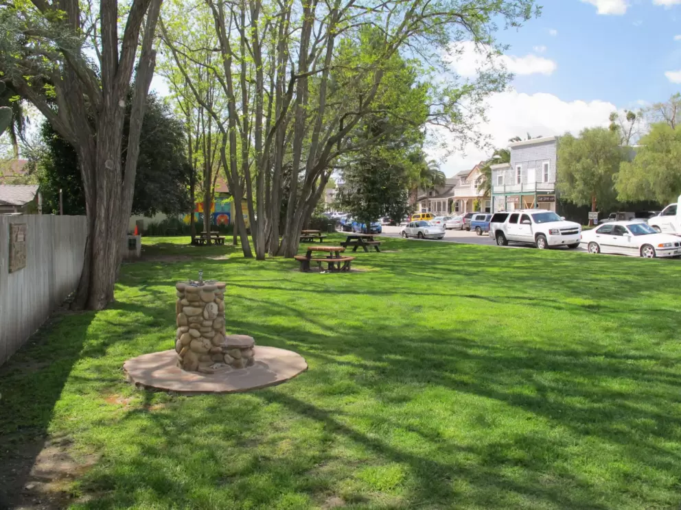 Park with picnic tables on Grand Avenue.