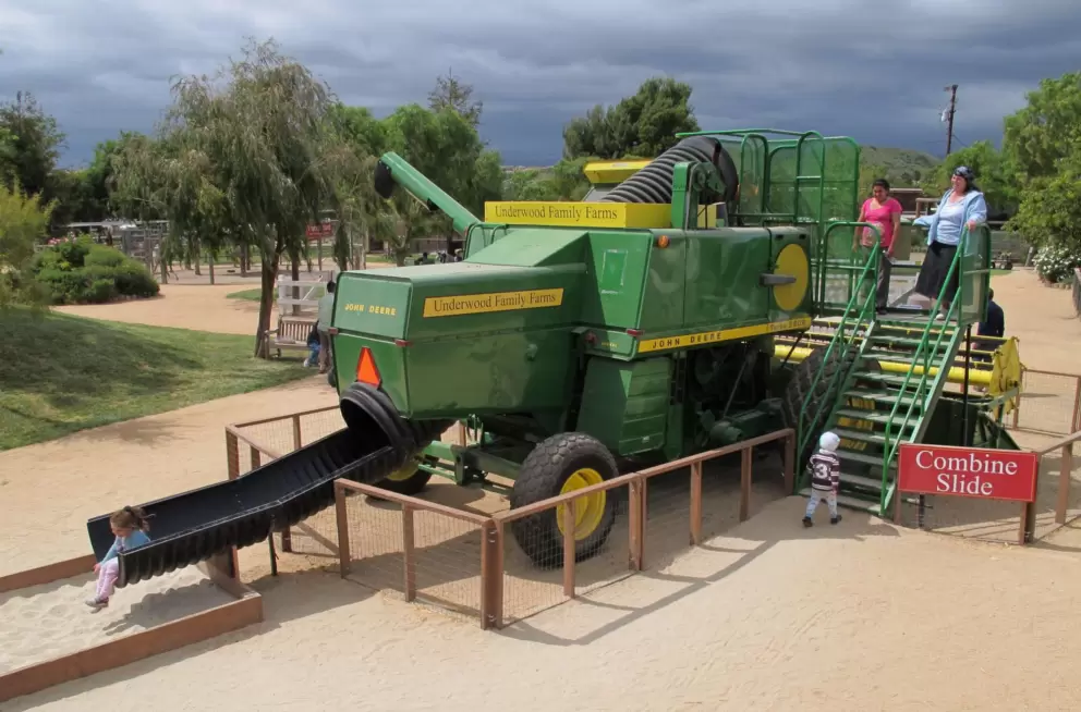 Sliding down the tractor shoot!