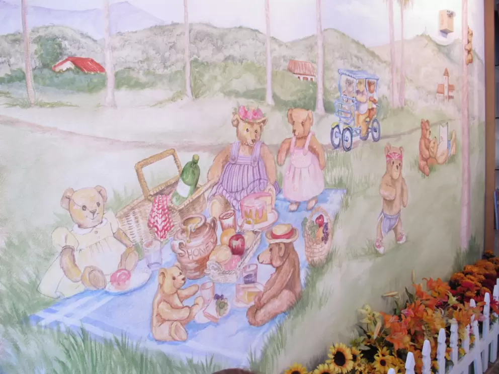 Tea room with mural of teddy bear picnic on lawn by Cabrillo Bike Path.