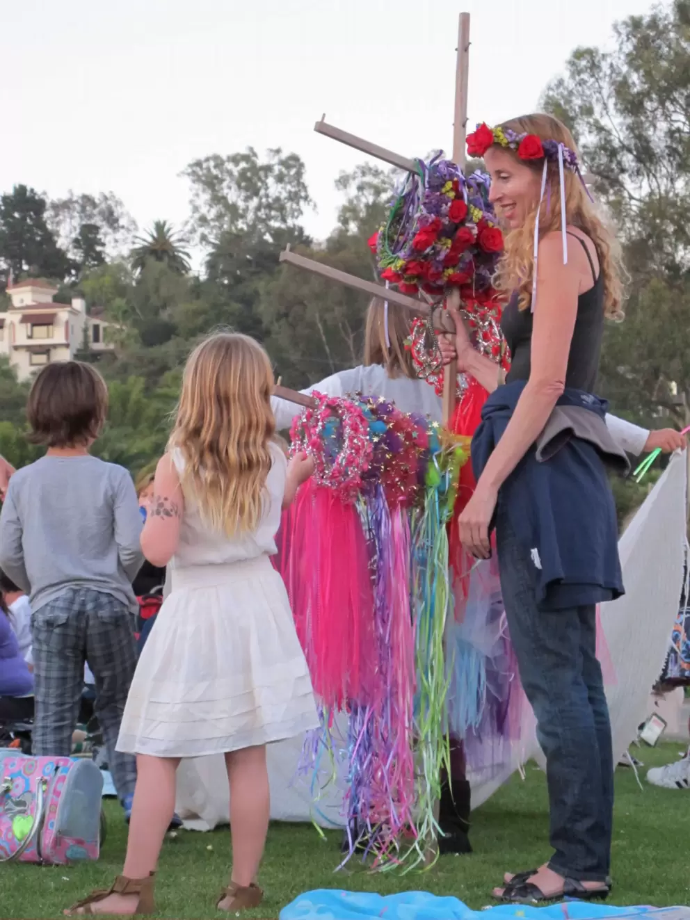 A woman sells festive garlands at Fiesta Pequena.