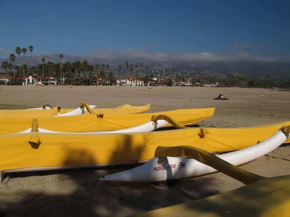 Canoes at the harbor end of West Beach.