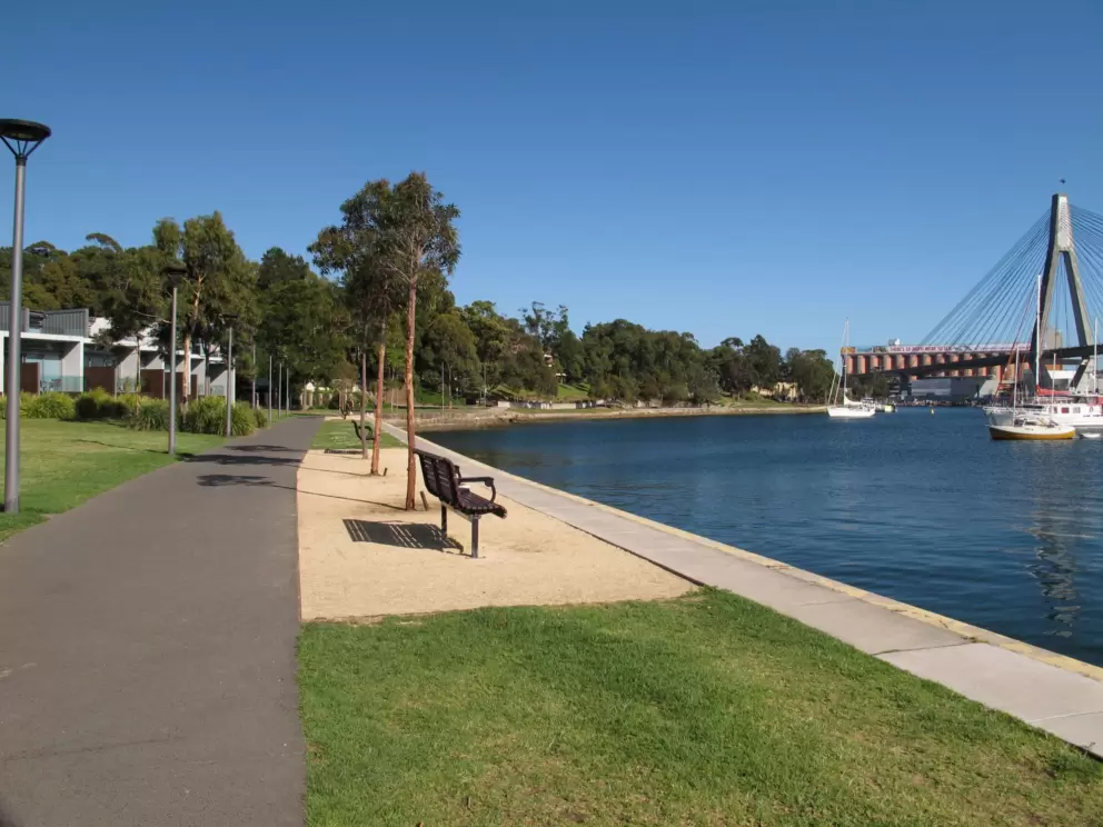 Wide walkway by the water.