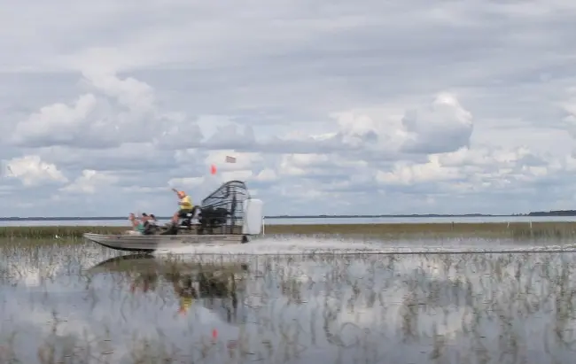 Another airboat passes us.