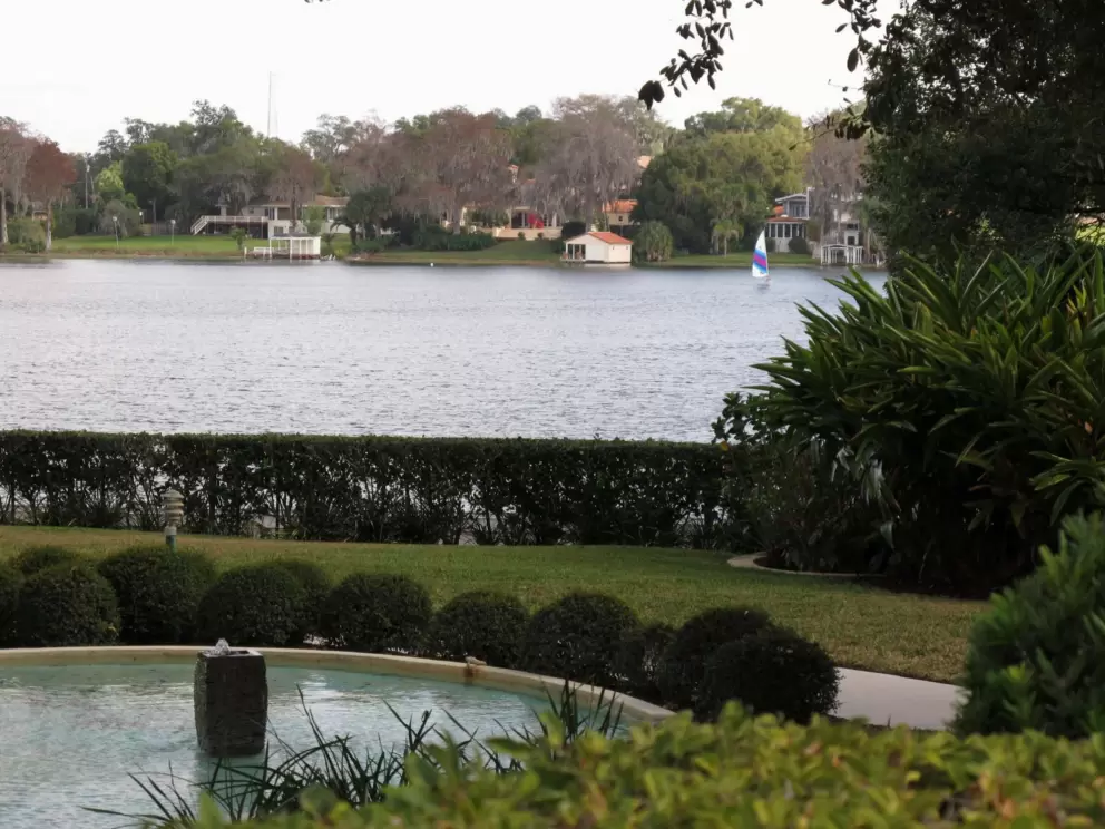 Residential fountain on Morse Blvd with lake in the distance.