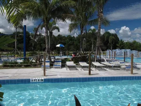 Lazy river and tubes piled up in the distance.