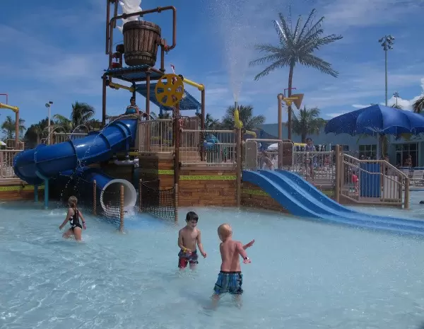 Boys playing by the splash park.