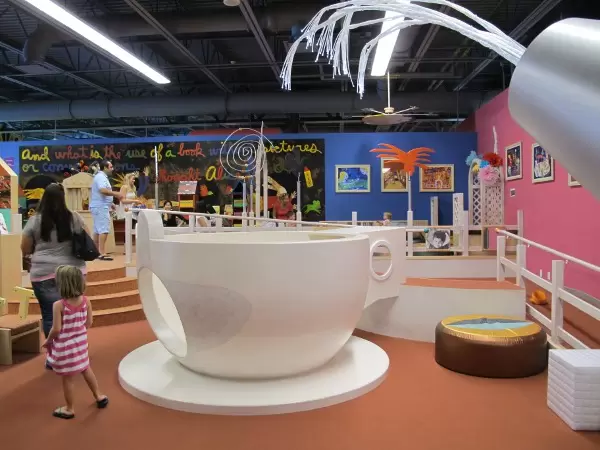 The giant teapot with iridescent water shooting into it! Climb inside here too!