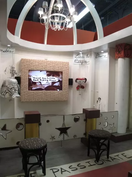 Puppets made by artists are displayed.