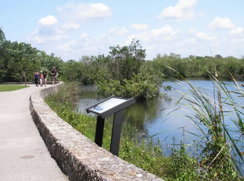 The paved walkway and information plaques.