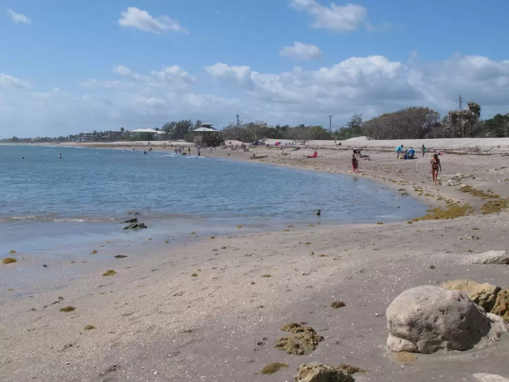 The beach is a cute semi-circle.