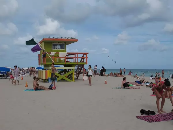 People enjoying the beach on Christmas day.