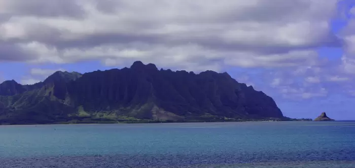 View of Chinaman's Hat from afar.