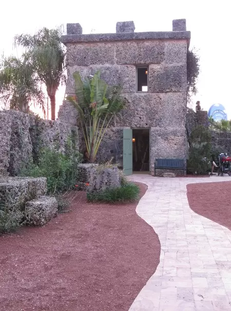 Winding pathway and castle-shaped living quarters.