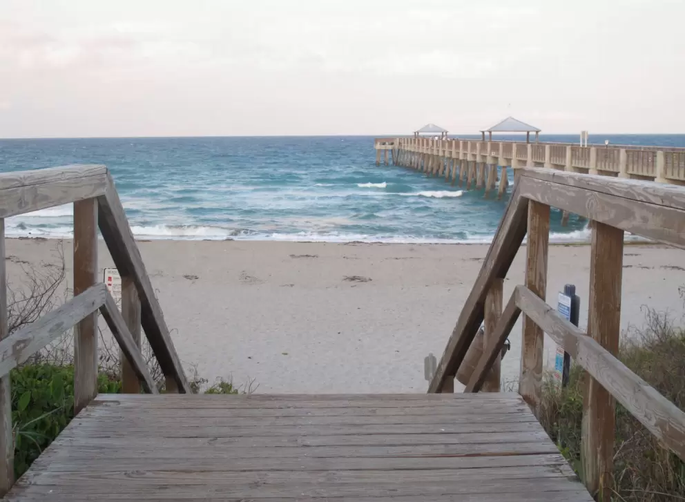 Stairs to Juno Beach at dusk.