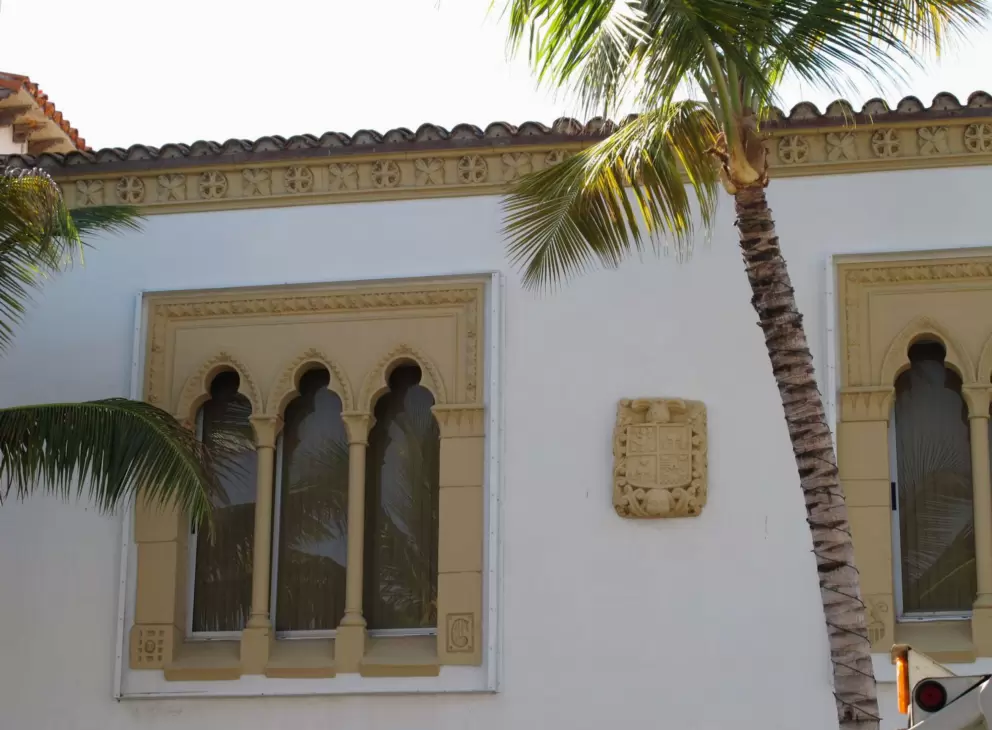 Palm and gothic windows.