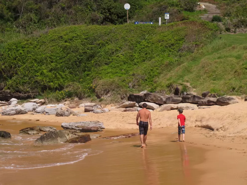 Father and son, and stairs up to Turrimetta Headland.