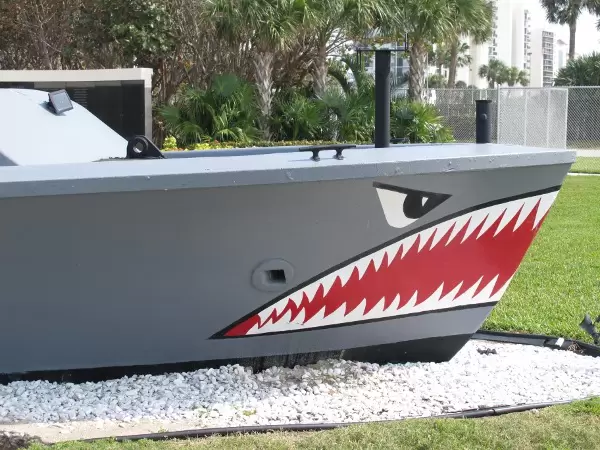 An LCPL or "cast and recovery" boat used by the frogmen. I love the shark design!