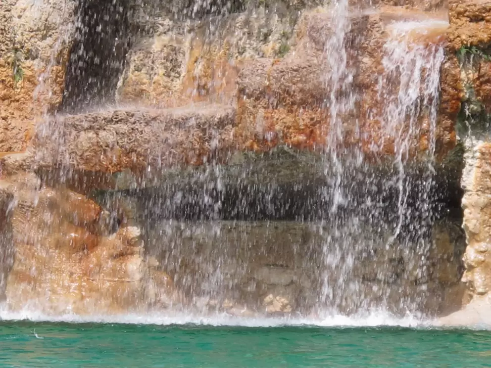 It's fun to swim under the waterfall and hang out in the cave.