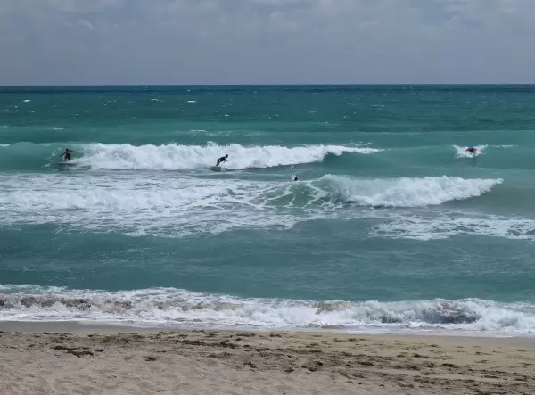 Surfer catching a ride.