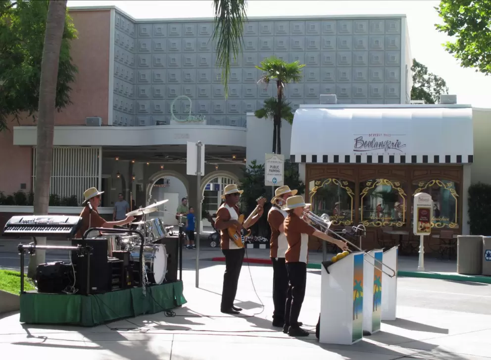 The Blues Brothers play in front of Beverly Hills Boulangerie.