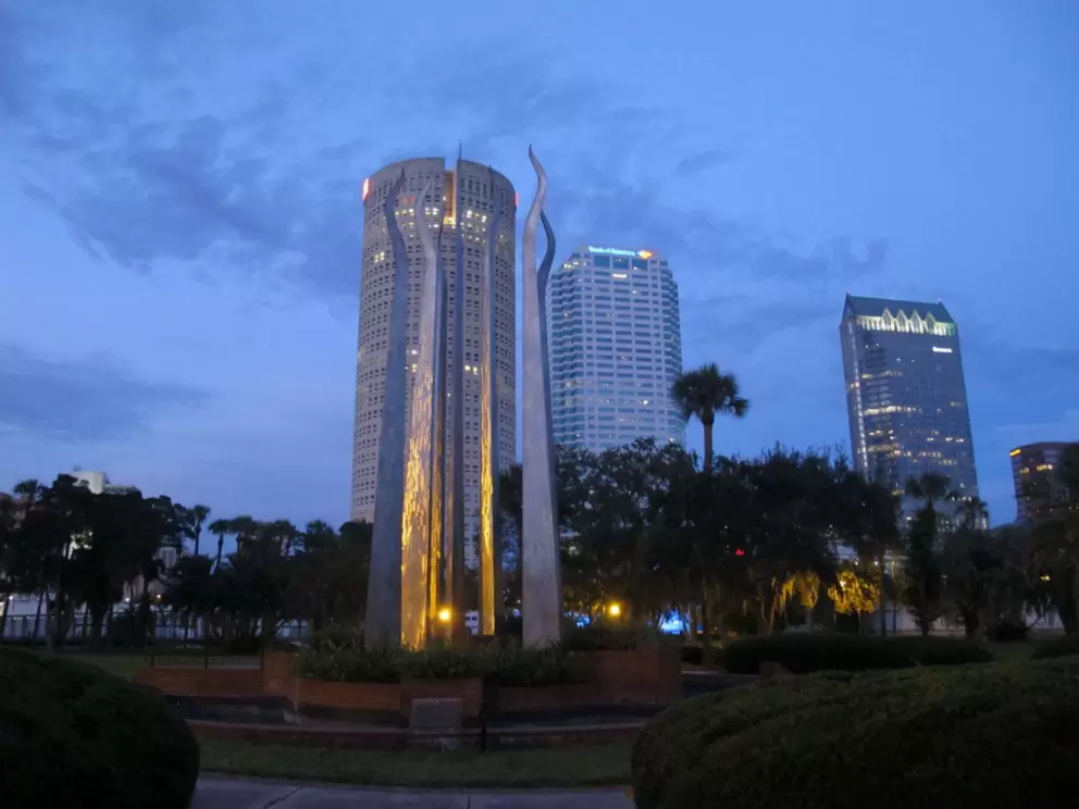Nighttime sculpture and city skyline from Plant Park.