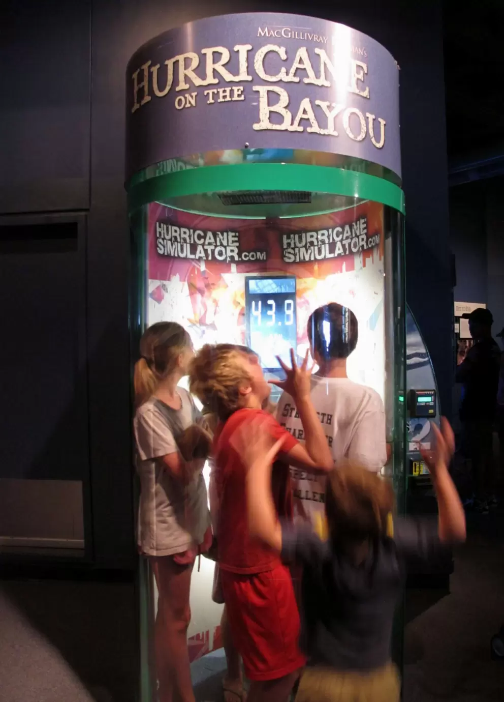 Kids enjoy the hurricane simulator.