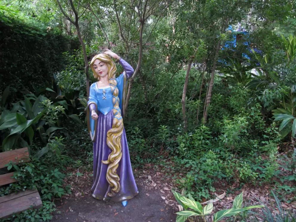 Rapunzel, with her hair braided in a ribbon.