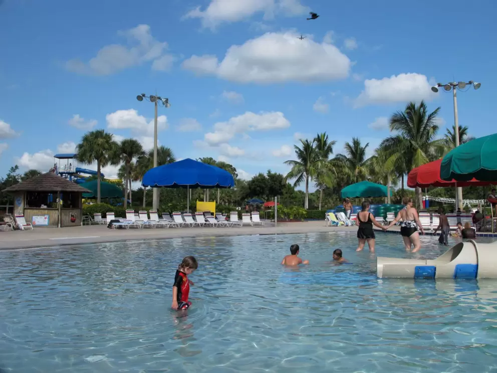 A child enjoying the shallow water at the splash playground.