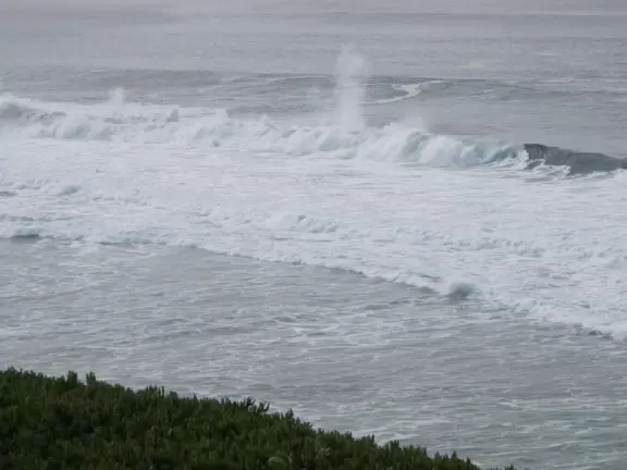Dunes and a pretty beach, on land that spooks you.