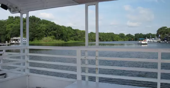 Huge island in St John River with hiking trails, indian shell mound, playground, one-room exhibit, and gift/camping shop.