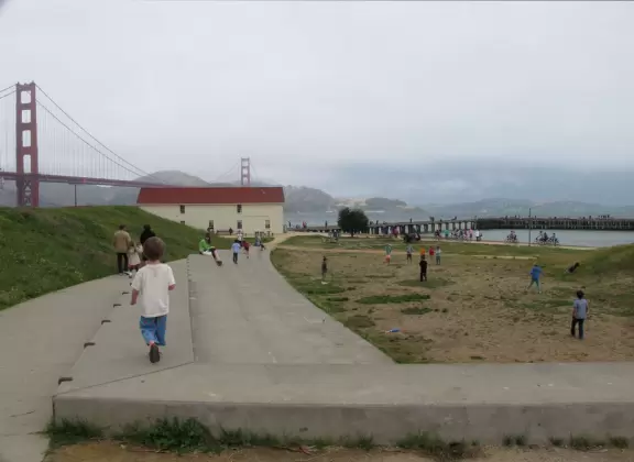 Picnic tables, amphitheater, gift/coffee shop, and wharf, under the Golden Gate Bridge!