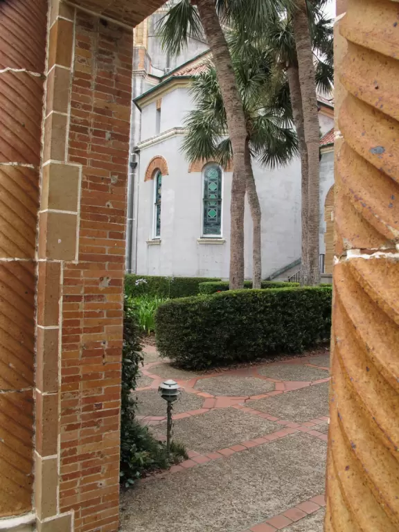 Stunning Spanish Renaissance style church with peaceful blue interior and Tiffany glass windows.